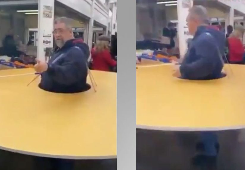 Man Wears Giant Cardboard Circle